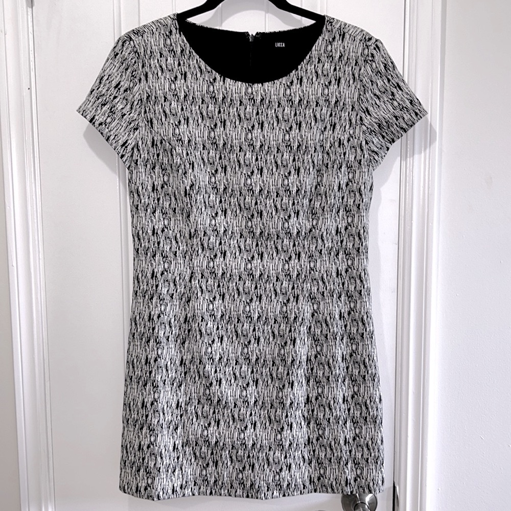 LUCCA black and white patterned cap sleeve dress/ romper.